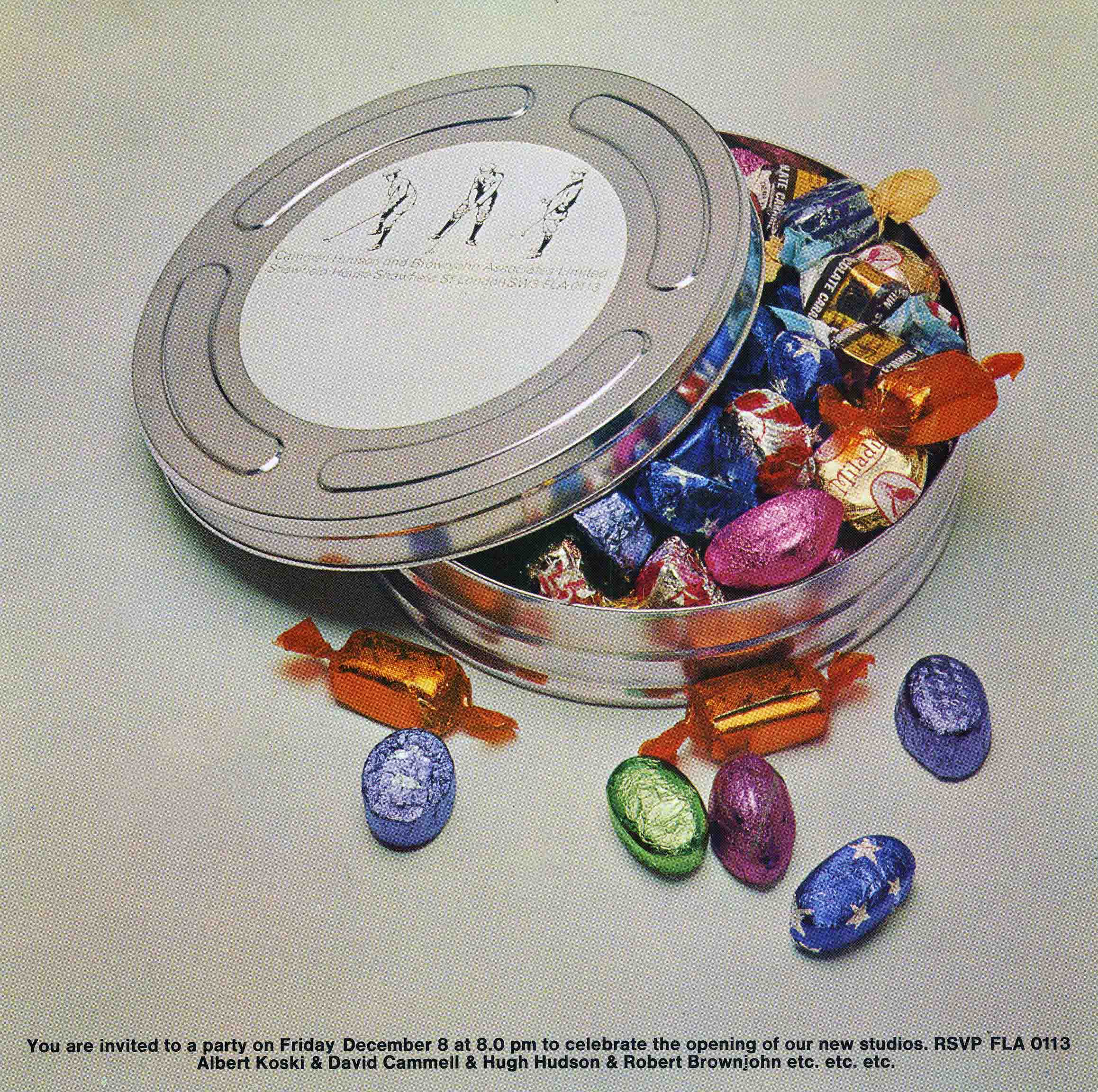 Film tin filled with colorfully wrapped candies